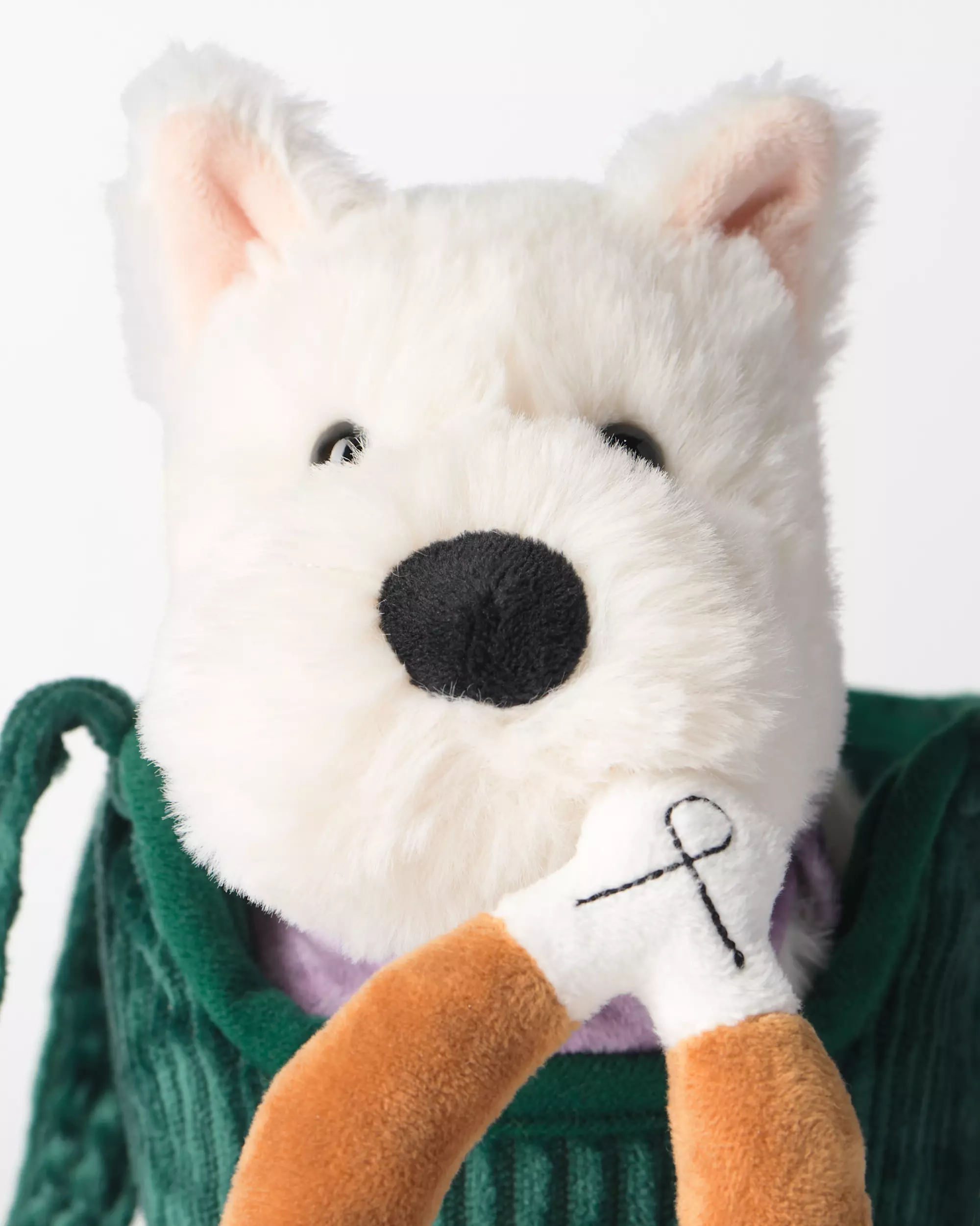 peluche chien dans un sac 21x19x10 cm 