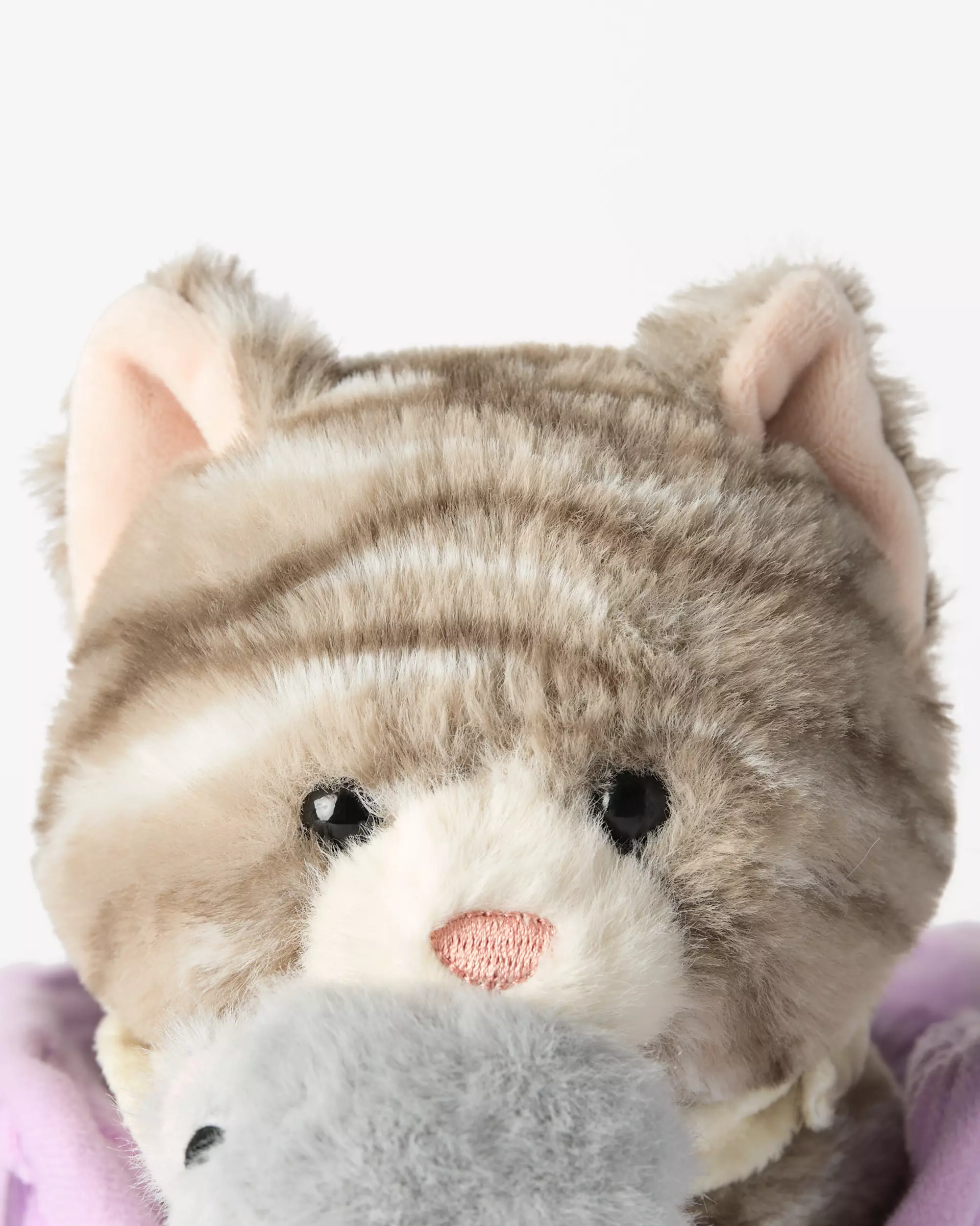peluche chat dans un sac 21x19x10 cm