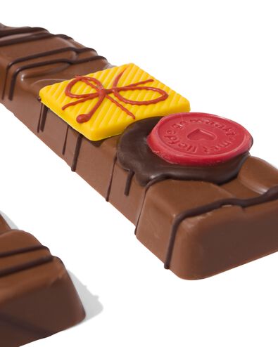 Lettre en chocolat d&eacute;cor&eacute;e &agrave; la main lait U 180g U lait - 24427421 - HEMA