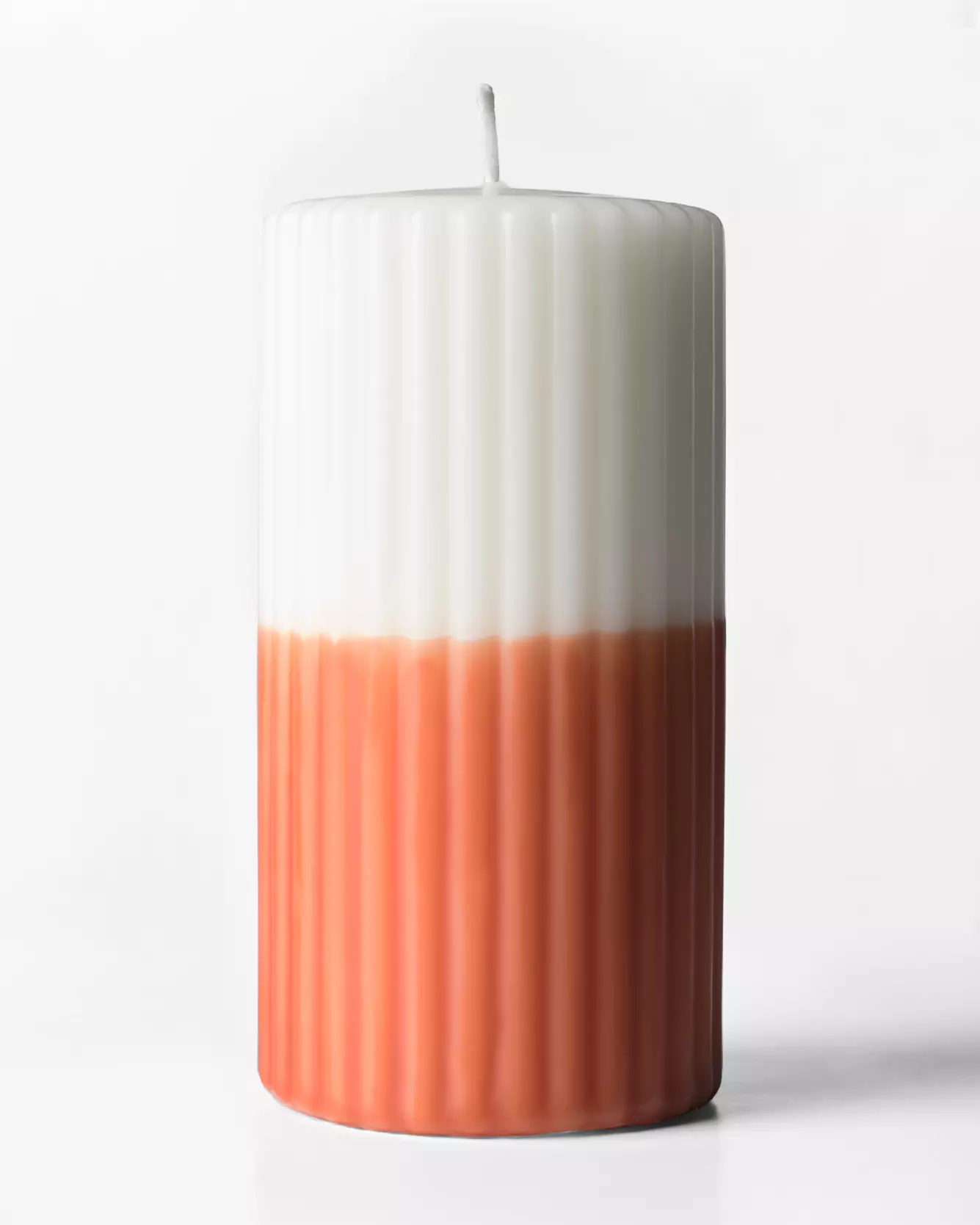 bougie cylindrique Ø 7 x 13 cm nervures ivoire-orange