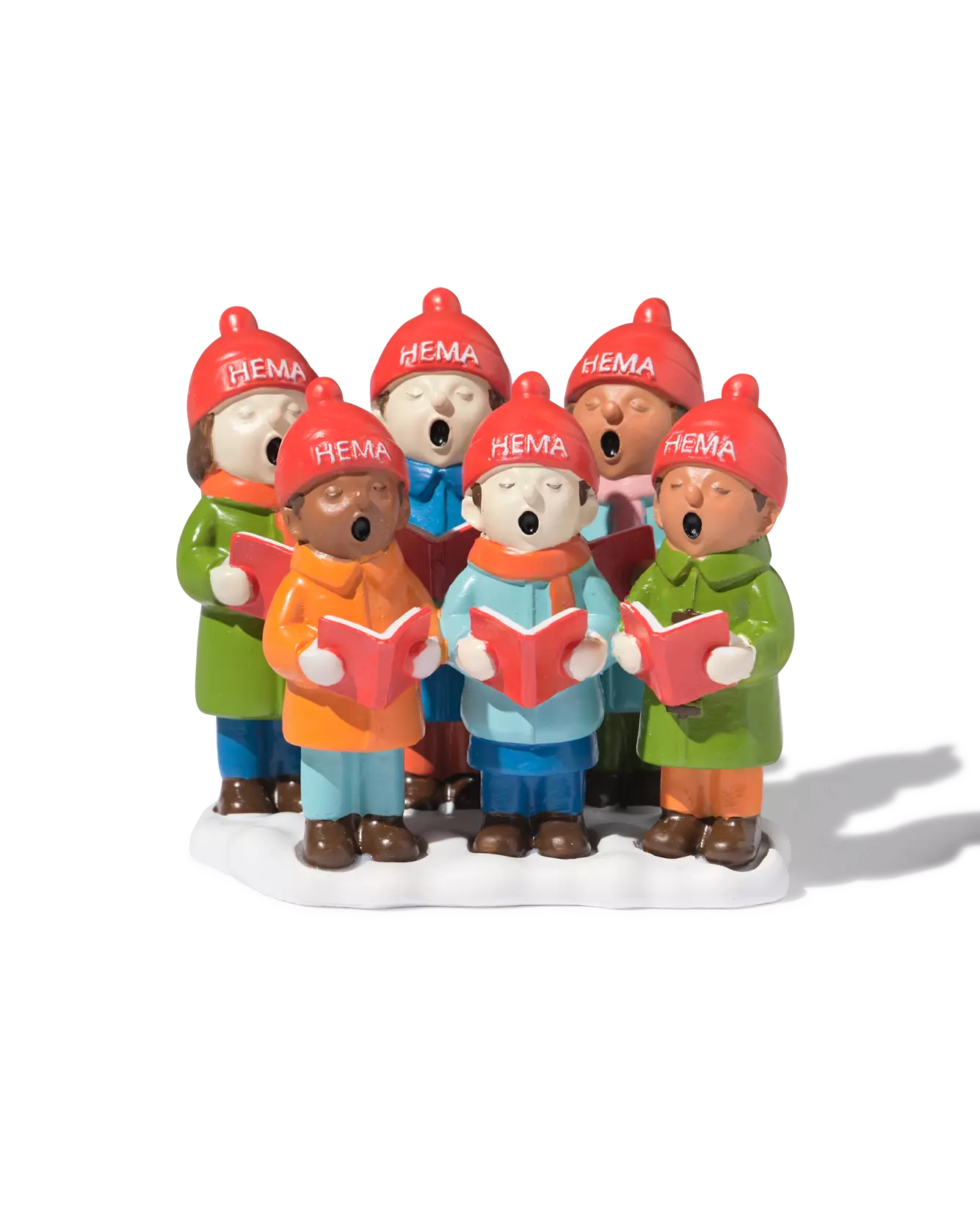 chorale sur scène devant la crèche