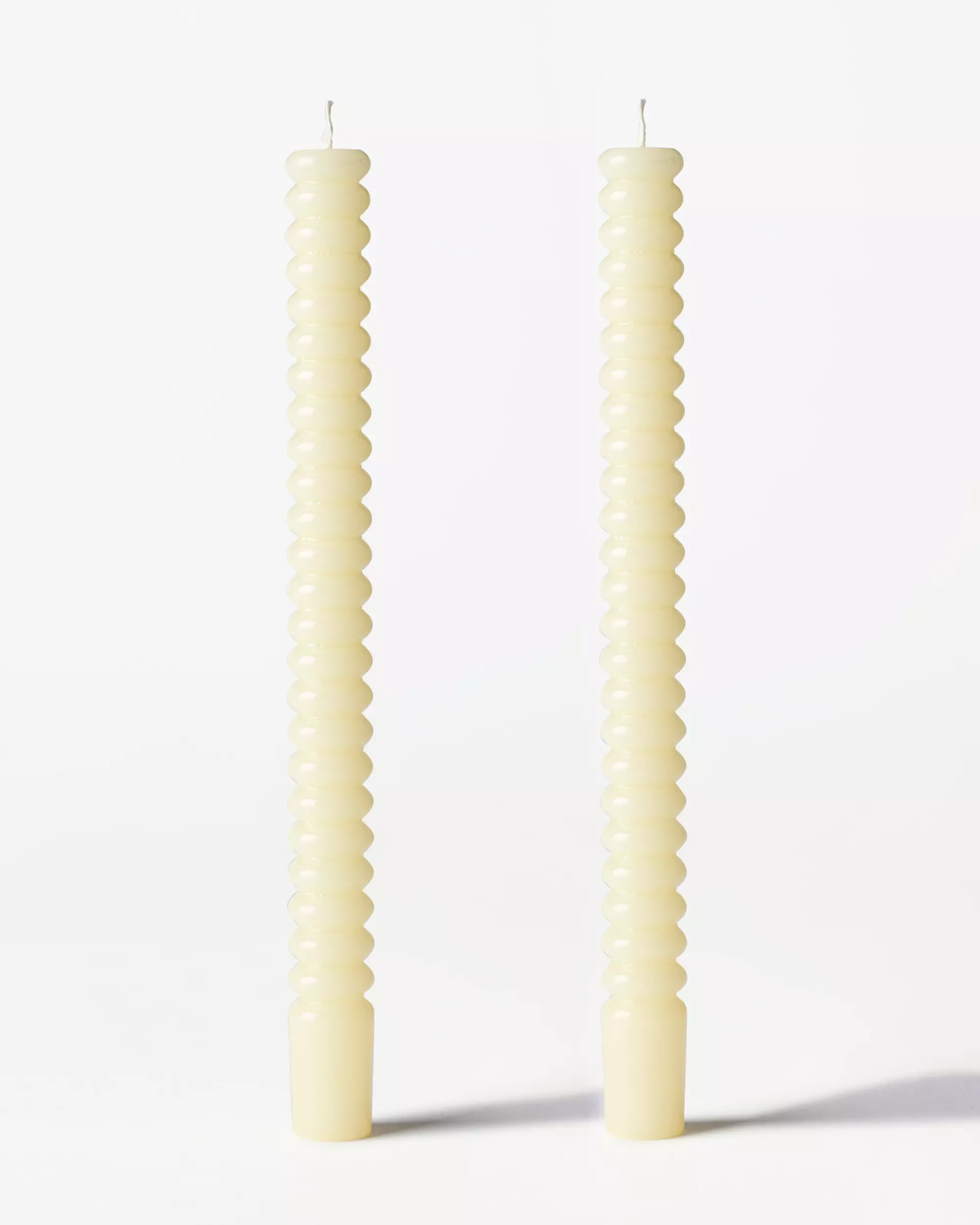 bougies longues ⌀2,2 x 25 cm nervurées jaune clair - 2 pièces